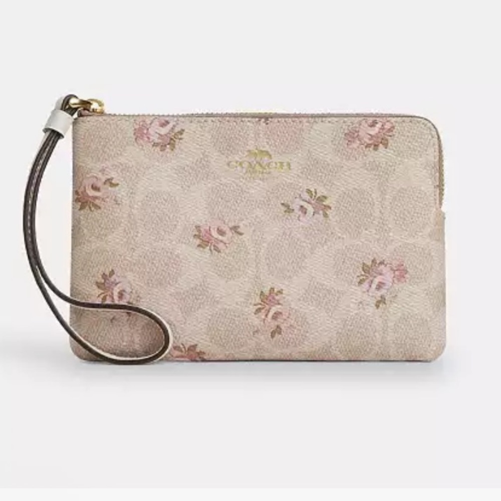 Coach Corner Zip Wristlet
In Signature Canvas With Floral Print NWT - Picture 1 of 5